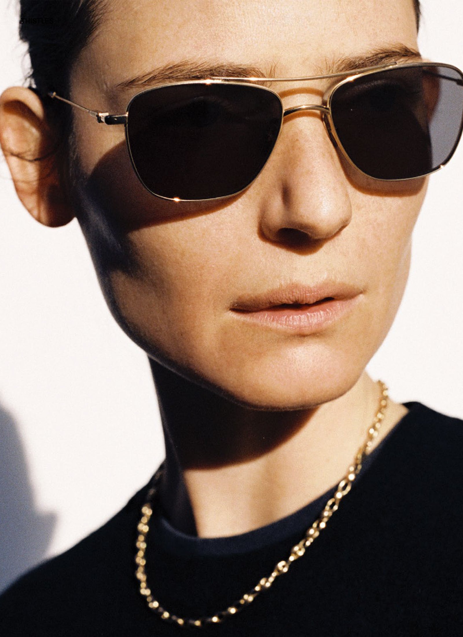 The Malone - Gold with Black Lens