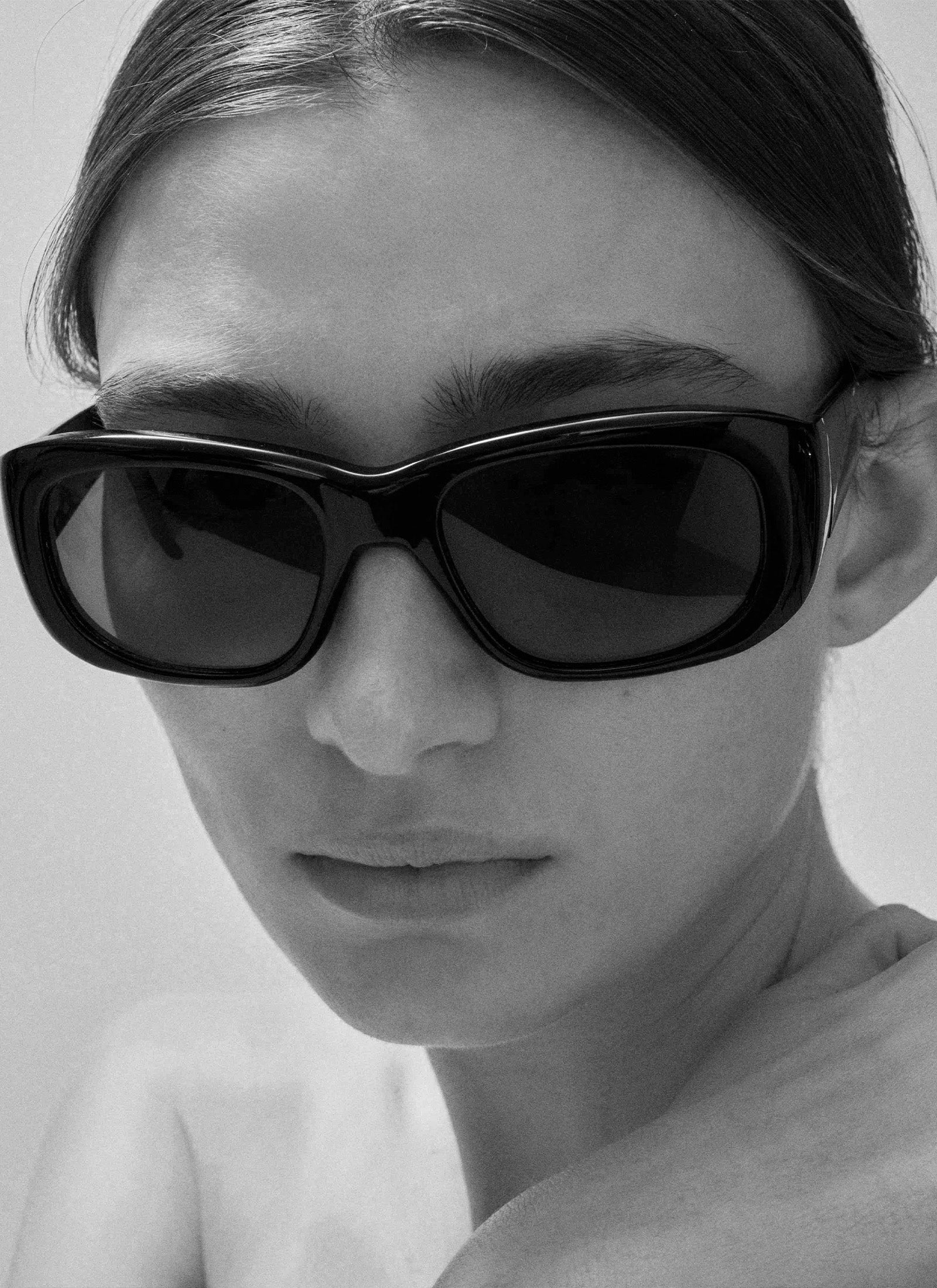 The Al - Crystal Brown with Black Lens