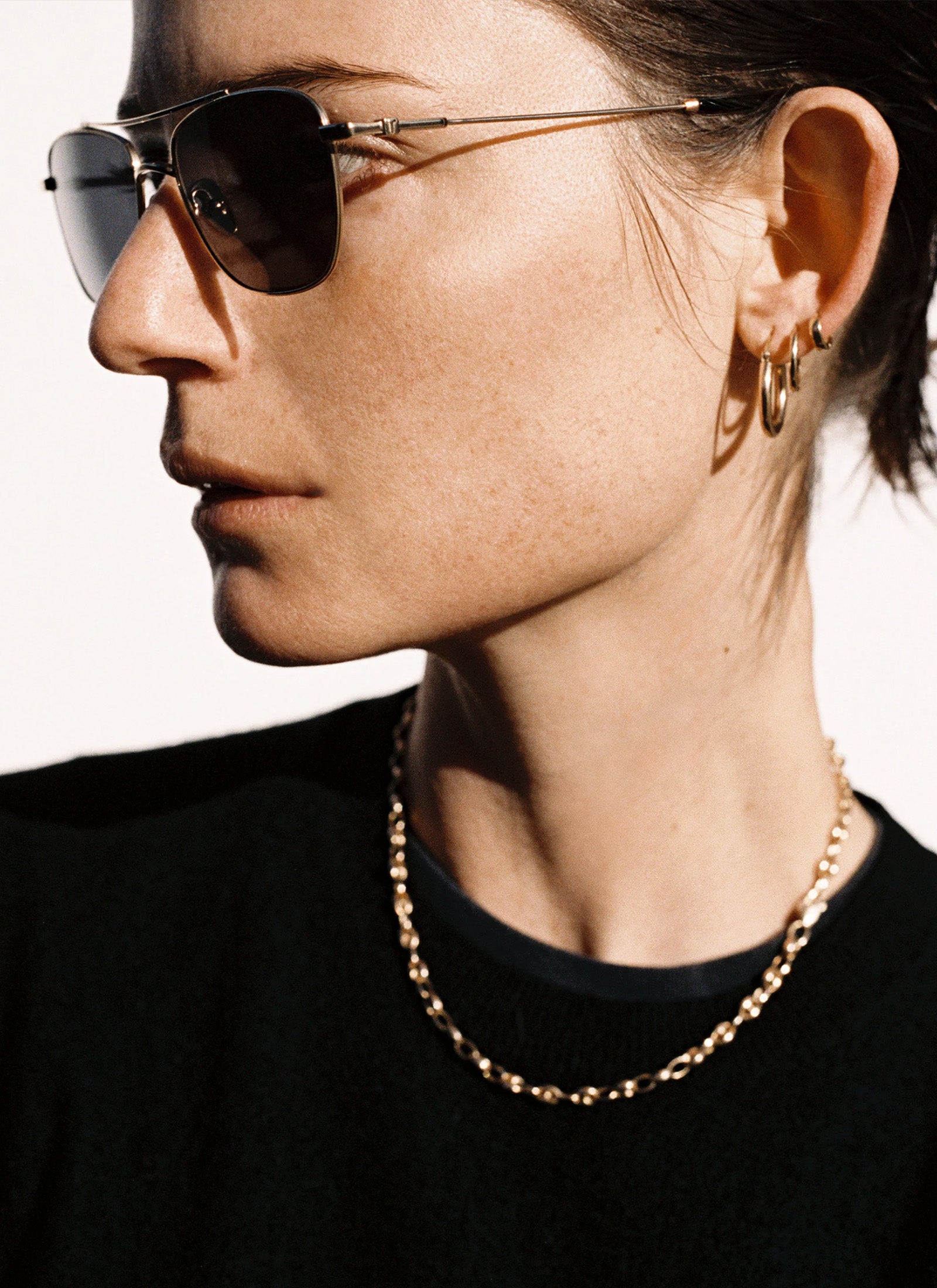 The Malone - Gold with Black Lens